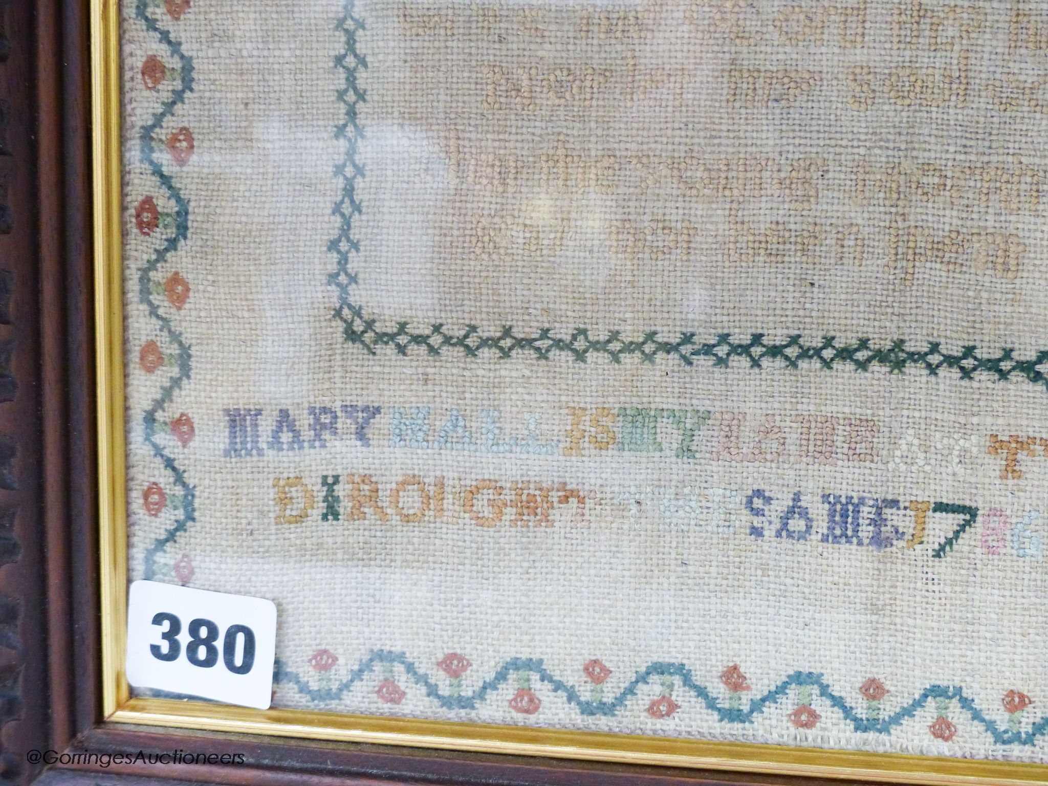 A George IV woolwork embroidered panel, by Ann Griffiths, dated 1818 and a George III needlework sampler dated 1786, 30cm sq.